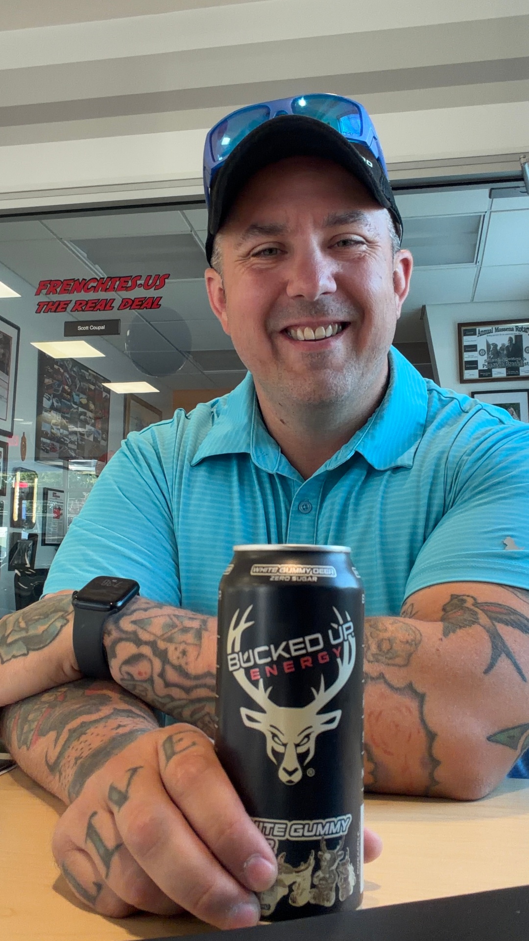 Corey Rush holding a Bucked Up Energy can