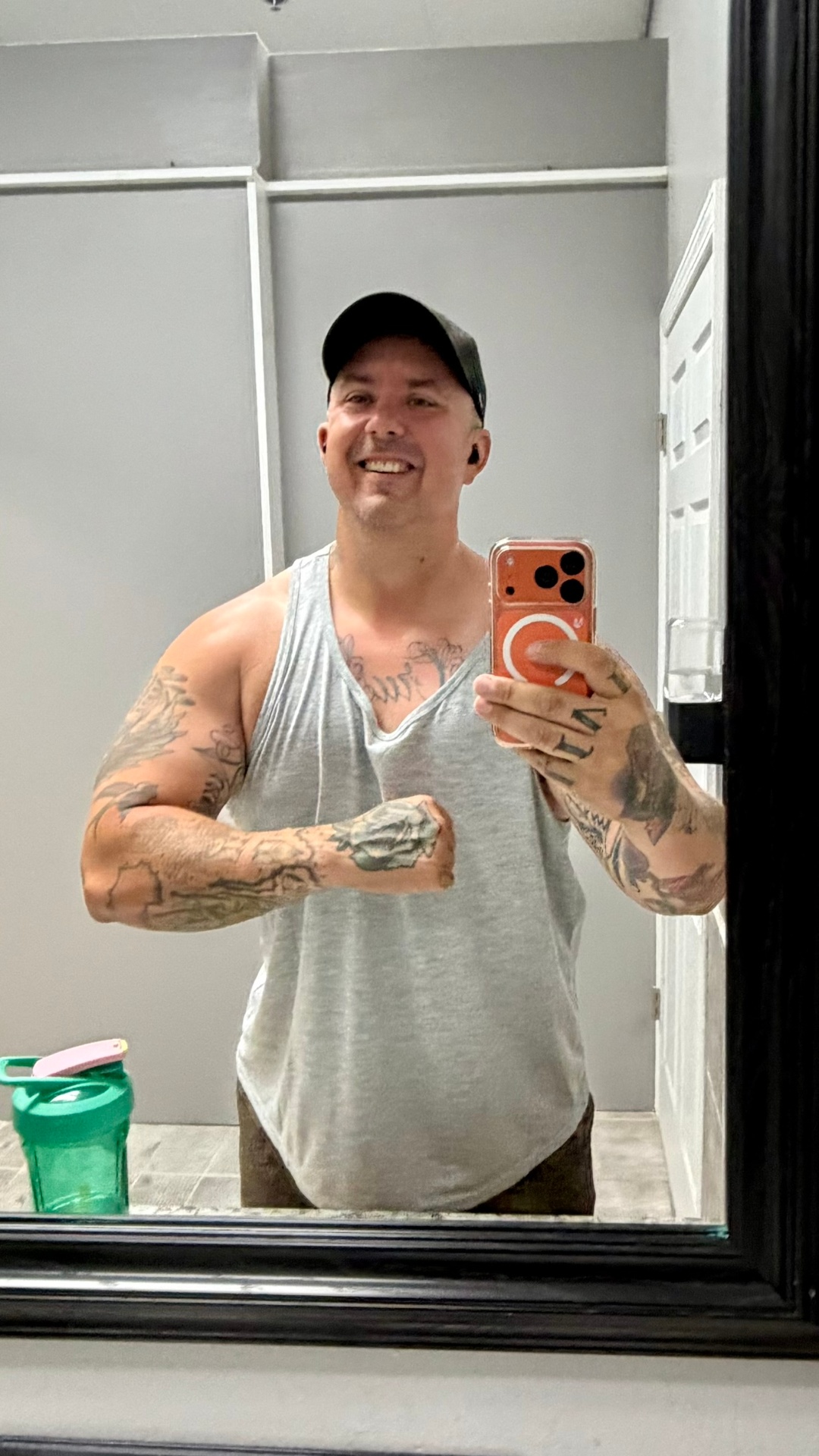Corey Rush in a grey gym tank
